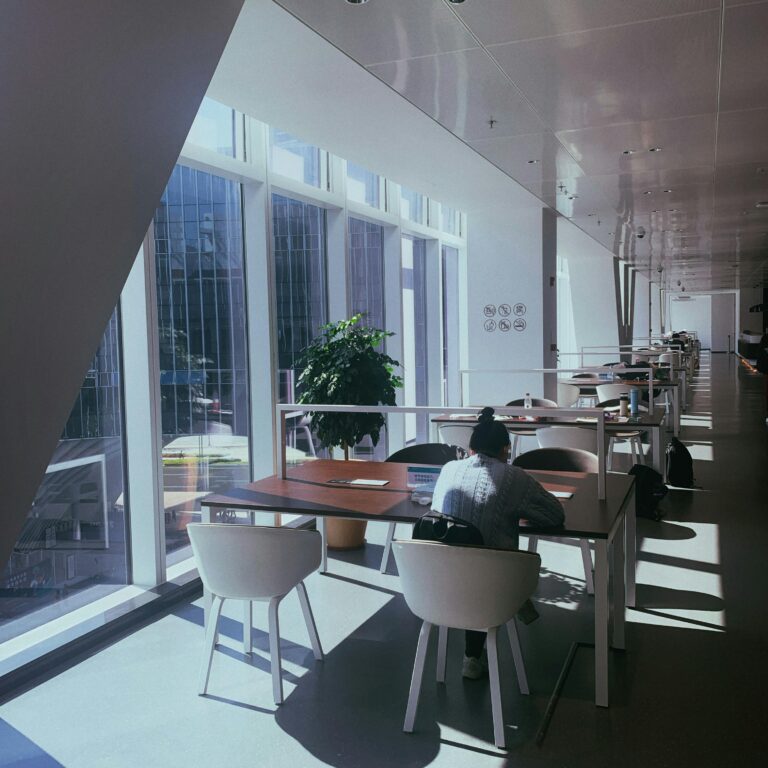 A serene study area with large windows, ideal for students, located in Shenzhen, China.